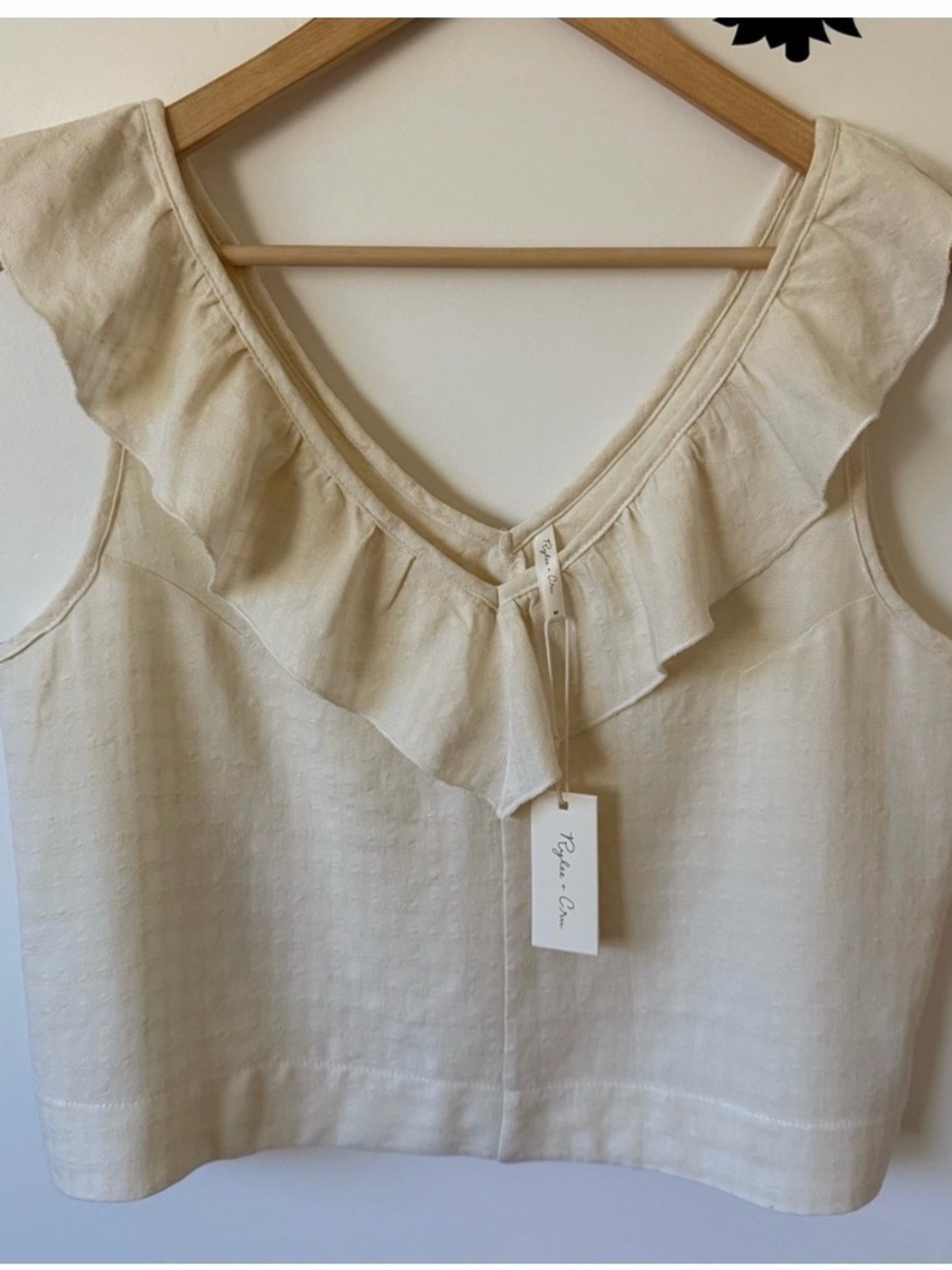ISO medium cream (not the gauze version) Rylee + Cru Cream Ruffle double V top